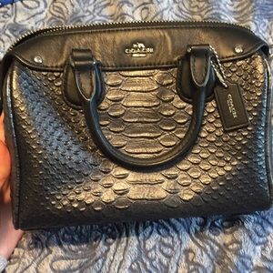 Sparkling black coach doctor purse